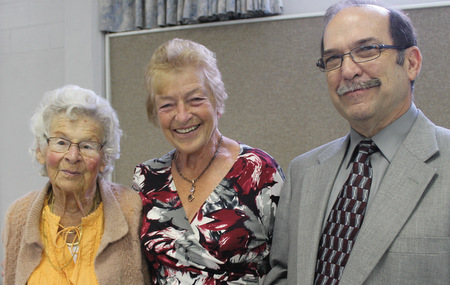 Charlotte Wiehler, left, poses with her friend Dora Janssen and Pastor Ed Kauffman. At 96, Wiehler is the oldest member of First Mennonite Church of Calgary and clearly recalls the early days of the church. — Donita Wiebe-Neufeld/Canadian Mennonite
