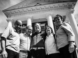 The “Stewart Five” after their April 9 court appearance for civil disobedience calling to shut down Stewart Detention Center. From left, Anton Flores-Maisonet, Kevin Caron, Jason McGaughey, Rebecca Kanner, and Maureen Fitzsimons. — Steve Pavey/MC USA