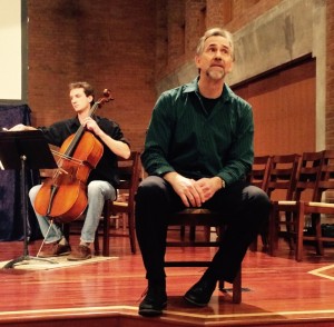 Chris Yoder of Harrisonburg, Va., plays the cello on stage with Ted Swartz during a performance of Listening for Grace.