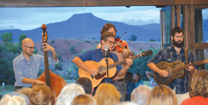 The Steel Wheels — from left, Brian Dickel, Trent Wagler, Eric Brubaker and Jay Lapp — perform Aug. 7 at the Mountain States Mennonite Conference annual assembly in New Mexico. — Jaime Lazaro/MSMC