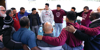 A group gathers to conclude a Nov. 3-5 Mennonite Men retreat on healthy masculinity at Camp Deerpark in Westbrookville, N.Y. — Mennonite Men