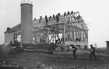 A barn raising is the classic example of mutual aid. — MWR file photo