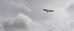 Hang glider in the clouds