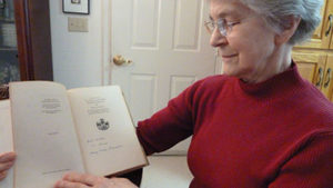 Doris Bomberger  with a signed copy of  Mennonite Community Cookbook that she  received from Mary Emma as a college graduation gift.  Photo provided.