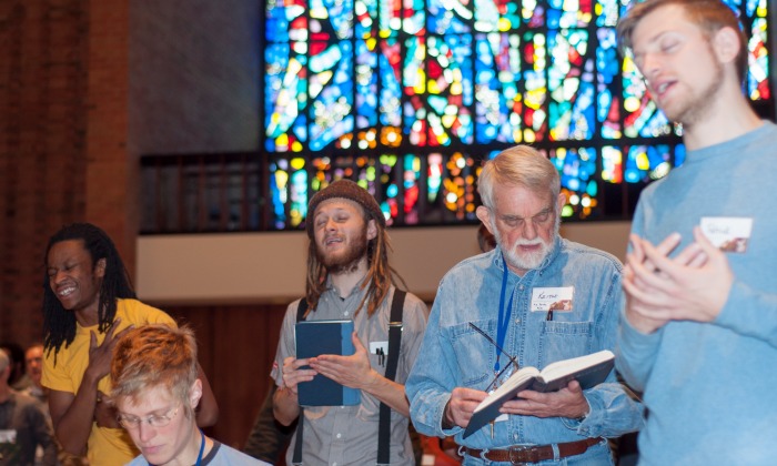 From left: Christian Parks, Kate Becker, Zach Kovitch, Keith Schrag and Patrick Ressler sing during worship at FFS. Photo by Kerry Bush.