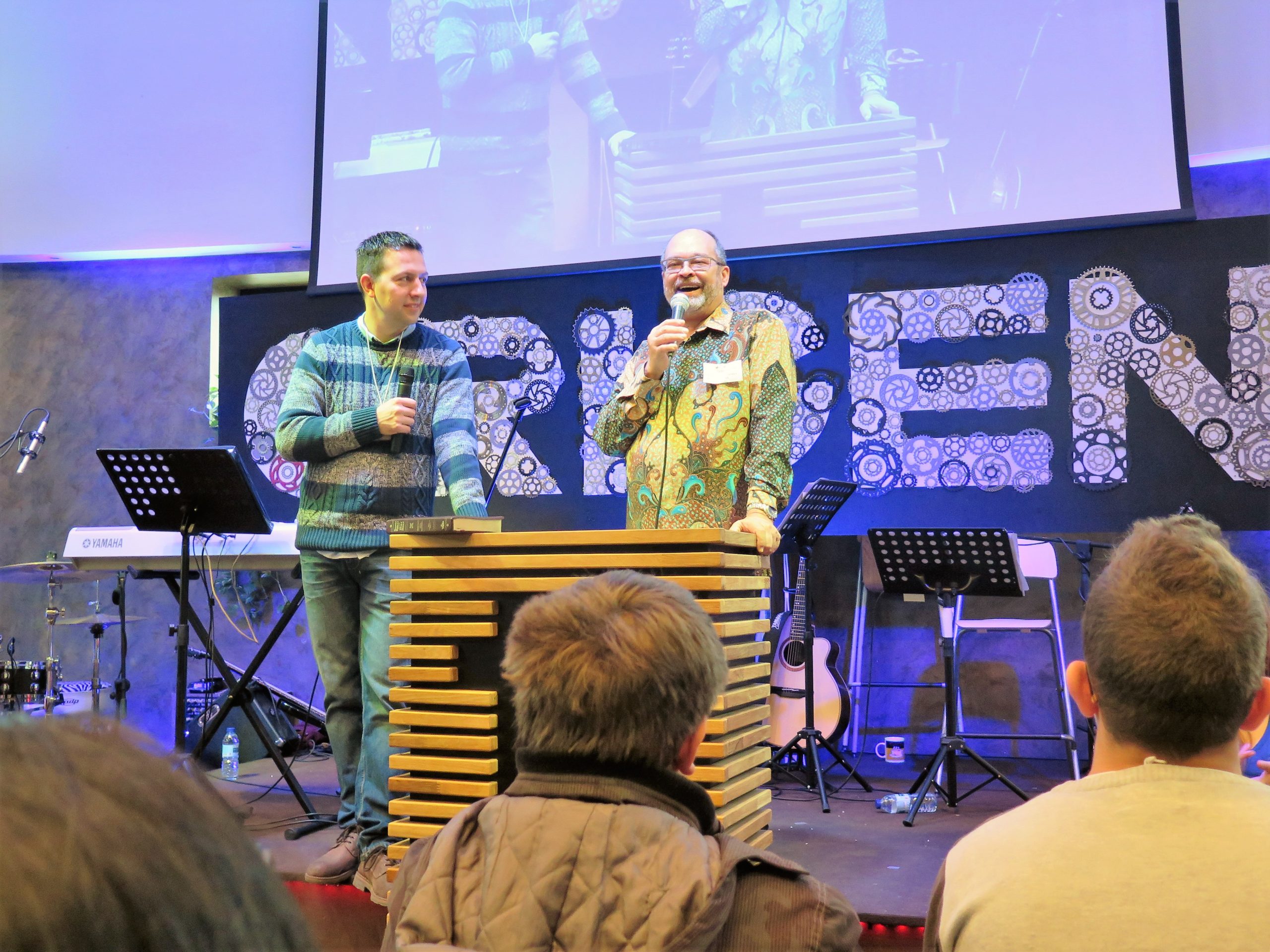 Executive Director of Mennonite Mission Network, Stanley Green shares greetings with the Comunidad Anabautista Unidas, the Mennonite church in Burgos, Spain, translated by Brian Fox. Photo provided.