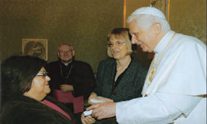 Iris meets Pope Benedict in 2007 as part of a Mennonite World Conference delegation. Behind them is Nancy Heisey, MWC president at the time. 