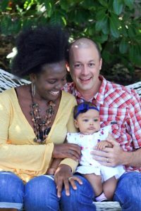 Kurt Hildebrand, Wilda Mondestin and their daughter, Akila