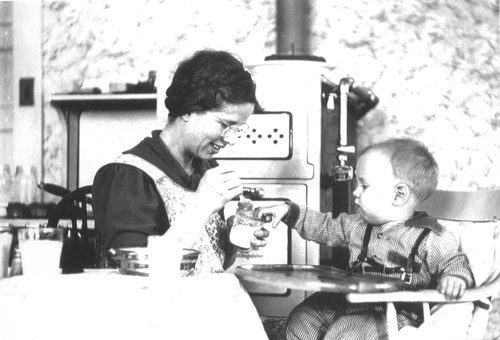 Rachel feeds son Emil in their North Newton, Kan., home. Photo provided