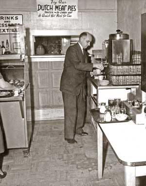 J. Winfield Fretz in his restaurant ca. 1958. Photo by Simon W. Schmidt (Mennonite Church USA Archives)