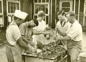 Mary Emma and others dressing chickens at the Grottoes, Va., Civilian Public Service camp. Photo provided.