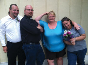 From left: Kenny Eckert, Hugh Hollowell, Amy Eckert, Ashley Barnes, members of the Love Wins community. Photo provided.