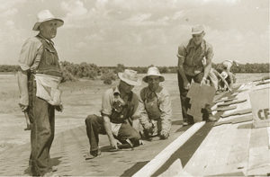 Vernon Becker (right) and other volunteers shingle the roof of the original Prairie View Hospital. Volunteers from Mennonite churches from as far away as Nebraska and Oklahoma contributed their skills to construction of the hospital prior to its opening March 15, 1954. Photo provided. 